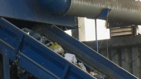 Garbage in machine for baling Stock Footage 121998949