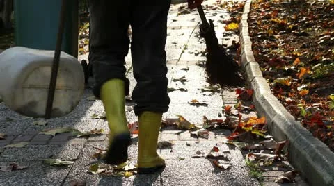 Garbage Man Walks in the Park Stock Footage 9818144