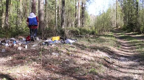 Garbage men on nature Stock Footage 50962569