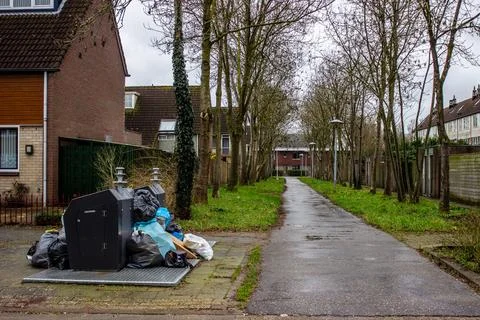 Garbage men striking making the underground garbage cans overflow Stock Photos
