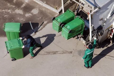 Garbage men at work, garbage collection, remove waste, recycling Stock-Fotos
