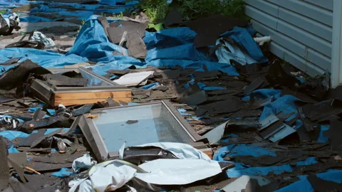 Garbage from the old roof. Roofer removed old roof covering. Process of Stock Footage 310160076