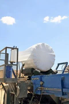Garbage packing machine in landfill Stock Photos