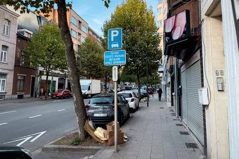 A garbage pile on the sidewalk in Brussels Stock Photos