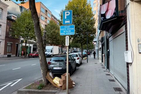 A garbage pile on the sidewalk in Brussels Stock Photos
