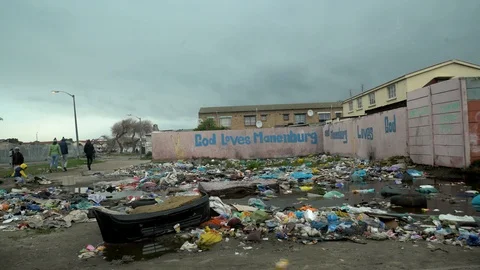 Garbage Piled Outside a Housing Development co Video stock 116743560