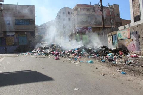 Garbage piles up because of the ongoing war and siege in Yemen. Stock Photos