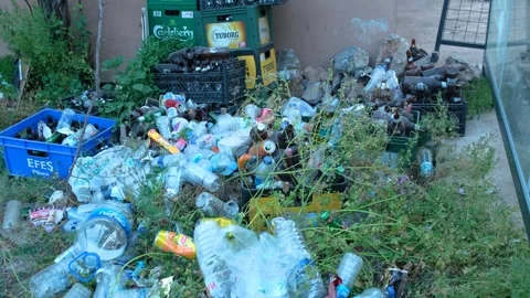 Garbage piling up on the street Video stock 247588373