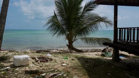 Garbage, plastic bottles and rubbish dumped at the beach. Stock Footage 107441733