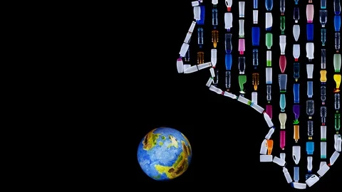 Garbage plastic bottles forming human head swallowing earth Video stock 96703797