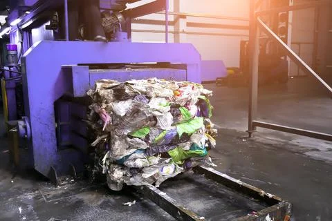 Garbage press.  Sorting of garbage. Stock Photos