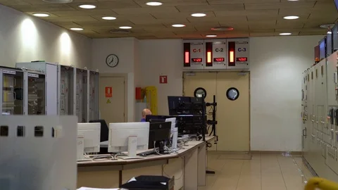 Garbage processing operator sits in front of control panel 動画素材 118932252