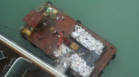 Garbage recycled from ship Stock Footage 999956