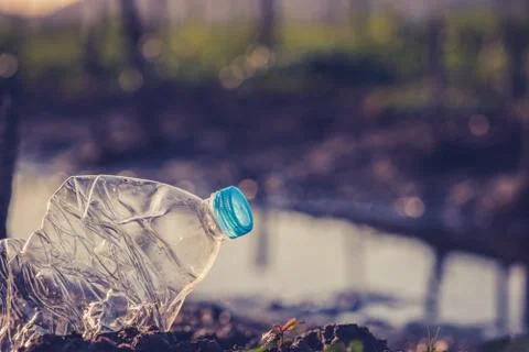 Garbage in the river is destroy the environment. World Environment Day.  Photos
