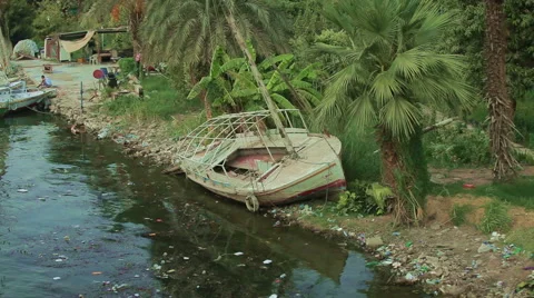 Garbage in the river Stock Footage 58346560