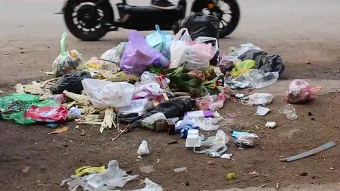 Garbage on the road Stock Footage 69186610