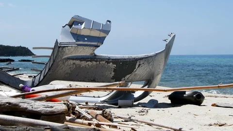 Garbage on a sandy beach Stock Footage 113406924