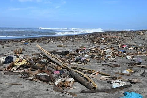 Garbage scattered on the beach Stock Photos