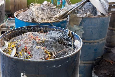 Garbage scraps discarded in the iron bin,selective focus Stock Photos