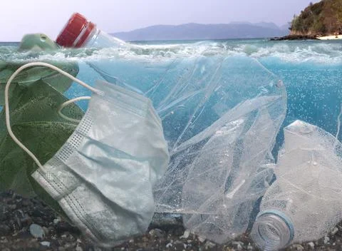 Garbage in the sea. Environmental pollution. Plastic waste. Stock Photos