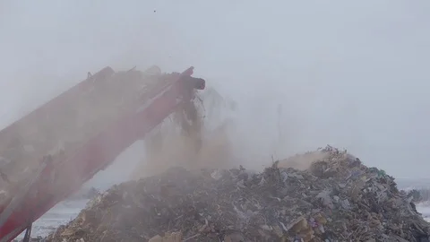 Garbage on shredding line at landfill at winter, Russia Stock Footage 101949230