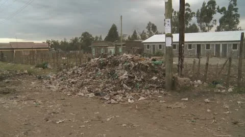 Garbage on slum street Video stock 11483337