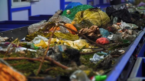 Garbage sorting conveyor on a waste recycling plant. 4K (UHD) Stock-Footage 112421937