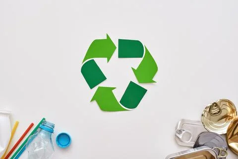 Garbage sorting saves the world. Crumple canns and plastic at the corners 스톡 사진