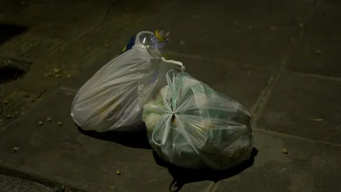 Garbage on the street Video stock 82093763