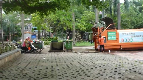 Garbage transfer station, workers are loading and unloading garbage Stock Footage 66184943