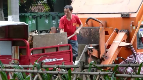 Garbage transfer station, workers are loading and unloading garbage Stock Footage 66185068