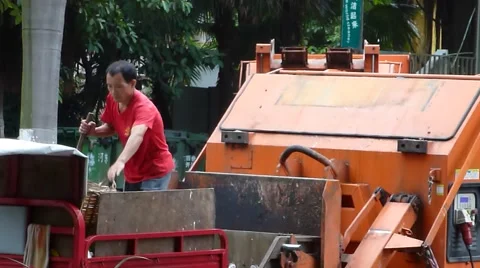 Garbage transfer station, workers are loading and unloading garbage Stock Footage 66185070