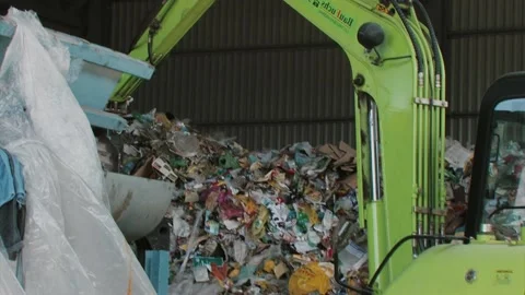 Garbage trash and plastic bottles splitters recycle process at the dump Stock Footage 91332050