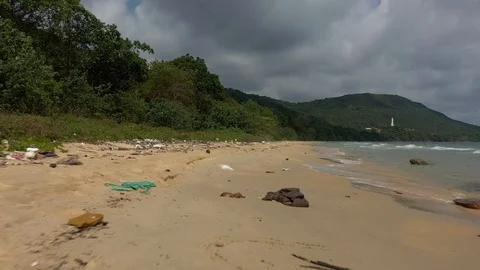 Garbage trash everywhere on a beach polluted ocean global warming warning climat Stock Footage 124602946