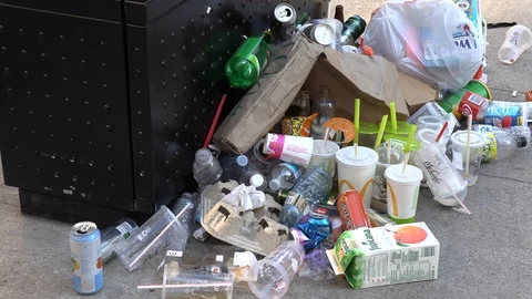 Garbage trash plastics and recycling waste bin on city street Stock Footage 123508148