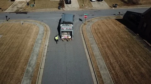 Garbage truck backing up Stockbeeldmateriaal 100559685