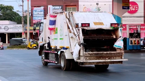 Garbage truck collection process in urban area waste management operation city Stock Footage 336386422