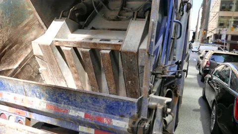 Garbage truck compactor in action Stock-Footage 130965992