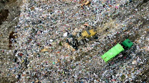 Garbage truck during unloading rubbish and food waste on landfill. 스톡 동영상 156605113