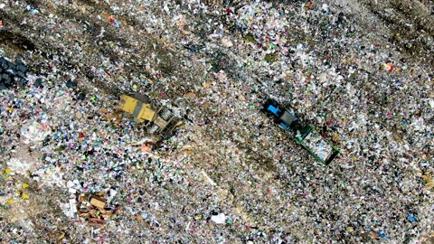 Garbage truck during unloading rubbish and food waste on landfill. Stock-Footage 156606129