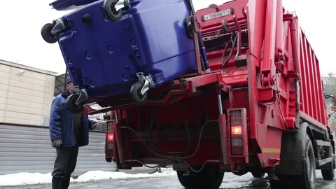 Garbage truck lowers container Stock-Footage 82054708