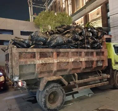 Garbage truck Stock Photos