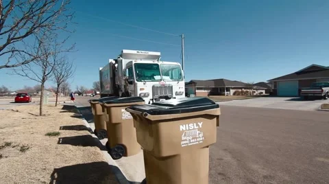 Garbage Truck Pickup Front View - Daytime Stock Footage 53502914