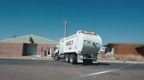 Garbage Truck Pickup Side View - Daytime Stock Footage 53503732