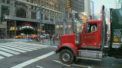 Garbage truck rumbles through the city Stock Footage