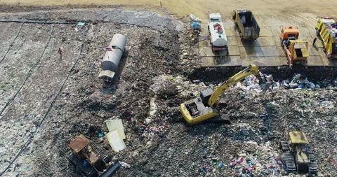 Garbage trucks are working in the waste sorting plant. Stock Footage 157406309