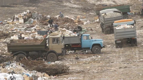 Garbage trucks on a dump Stock Footage 47189869