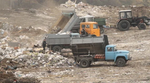 Garbage trucks on a dump Stock Footage 47862047
