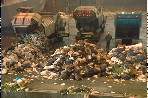 GARBAGE TRUCKS DUMP LOAD 2 Stock Footage 1052831
