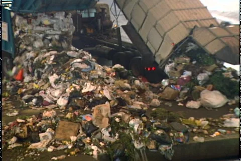 GARBAGE TRUCKS DUMP LOAD Stock Footage 1052383